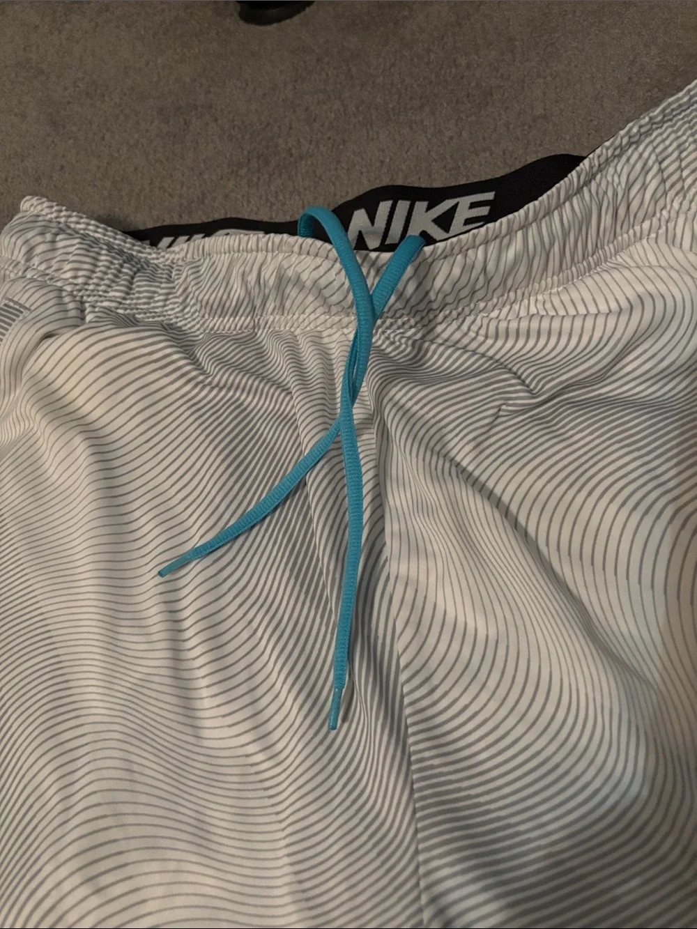 Nike Men’s White Athletic Shorts with Blue Swoosh - Picture 3 of 6